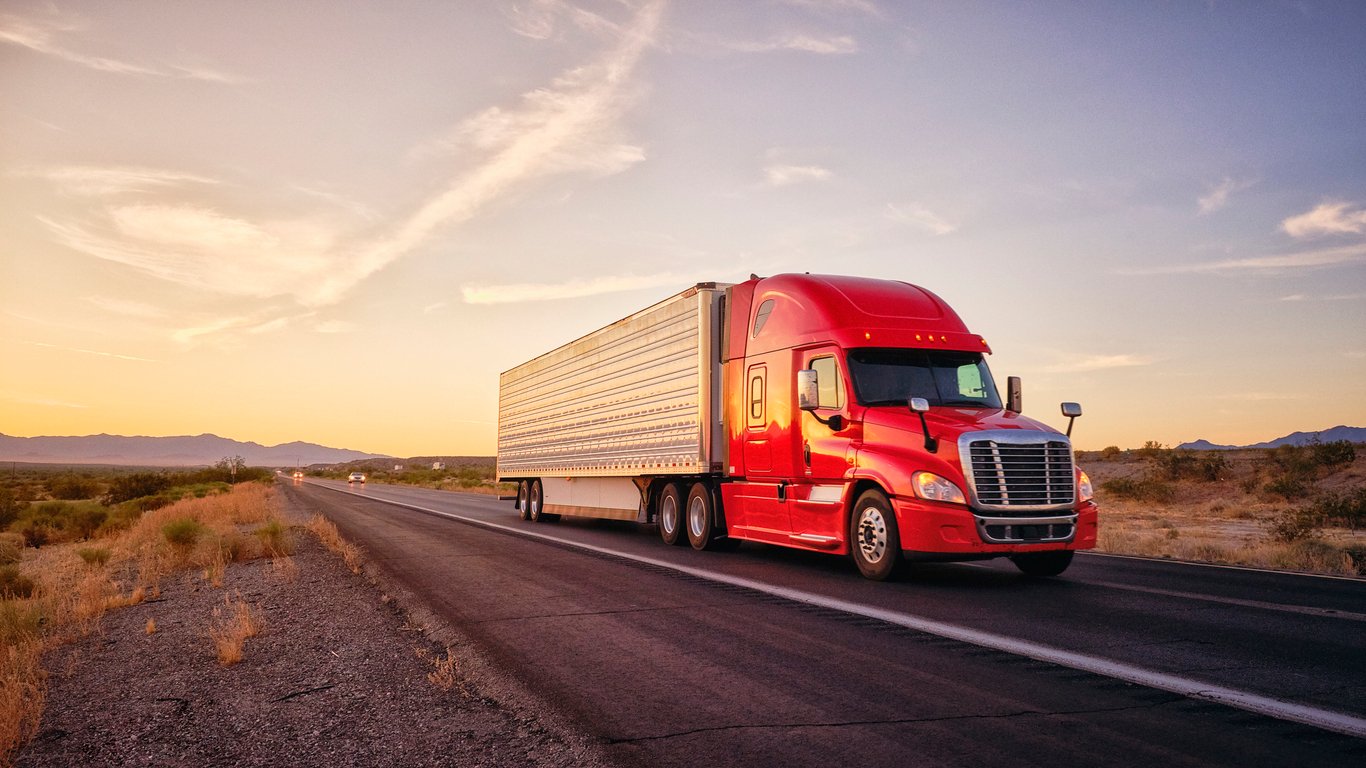 truck driving down highway